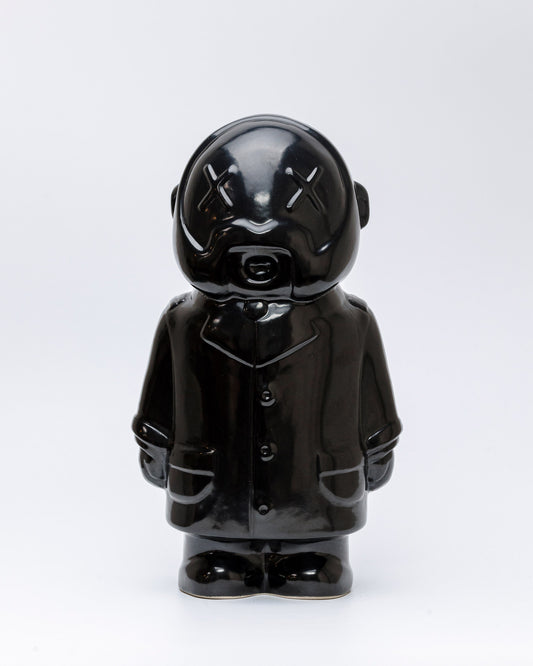 GRAUTO.BOT, escultura en gress negro brillante